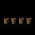 Four wooden Hinoki sake cups
